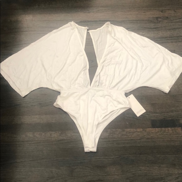 EKATTIRE V cut open white bodysuit top small